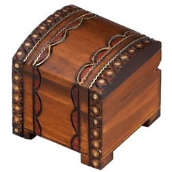 This small chest box is detailed with a handsome brass inlaid design. Handmade in the Tatra Mountain region of Poland.