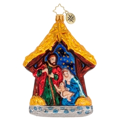 Mary, Joseph and baby Jesus take refuge in this wooden manger. They share the space with a mama and baby sheep under the brightly shining Star of Bethlehem.