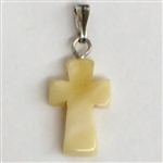 Free form piece of Baltic amber in the shape of a cross. Size and weight vary but approx .8" x .4".