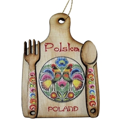 Great ornament made of wood featuring a traditional floral design from the Lowicz region.  Ready to hang.  Reverse side has its own magnet too. Size approx 2" x 2.75". Made In Poland.