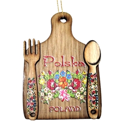 Great ornament made of wood featuring a traditional floral design from the village of Zalipie in southern Poland. Ready to hang. Reverse side has its own magnet too. Size approx 2" x 2.75". Made In Poland.