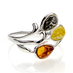 Petite artistic three stone amber ring. Setting size is approx .5" x .5"