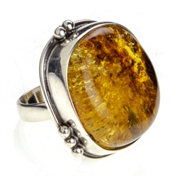A large 1" square amber cabochon set in sterling silver. Size is 7.5" adjustable one time to 8' - 8.5".
