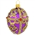 An egg-ceptional choice for the tree, this dazzling glass ornament was inspired by the famous jeweled eggs of the House of Faberge, in St. Petersburg, Russia. Featuring sparkling glitter folk patterns and glistening gold lines studded with eye-catching