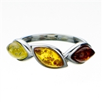 Three shades of amber set in sterling silver.  Amber size is 1" x .25".