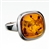 Classic looking .5" amber cabochon framed in sterling silver.