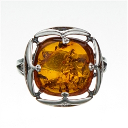 Gorgeous .5" square amber cabochon is an artistic sterling silver frame.