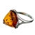 Triangular shaped honey amber cabochon set in sterling silver.  Size is approx 5."x .5".