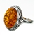 Classic oval shaped amber cabochon set in sterling silver.  Size is approx .75" x .5".