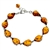 9 elegant drops of amber each set in sterling silver. Bracelet length is 7.5" and adjustable smaller.