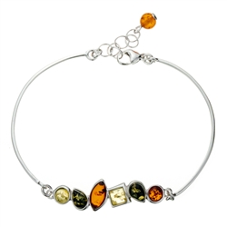 This sterling silver bracelet features three shapes and shades of amber. This is a 7.5" bracelet with a .5" extender.