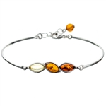 This sterling silver bracelet features three amber cabochons. This is a 7.5" bracelet with a 1" extender.