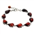 9 elegant drops of cherry amber each set in sterling silver . Bracelet is 8" long and adjustable smaller.