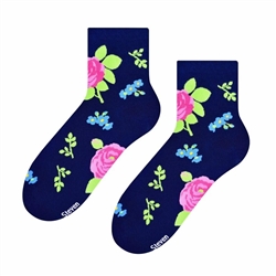 Folk is in fashion and these beautiful Polish hosiery feature a traditional Silesian floral design on a black background. Made in Lowicz, Poland.