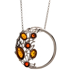 Gorgeous circle of sterling silver studded with 6 amber cabochons.  Pendant  size is approx. 1.25" diameter.  Sterling silver adjustable chain 16" - 18" long.