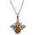 Sterling silver honey bee above a beautiful honey amber cabochon drops. Pendant size is approx. 1" x .75".