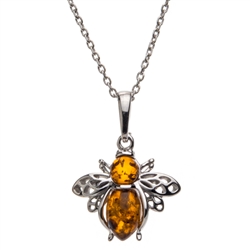 Sterling silver honey bee above a beautiful honey amber cabochon drops. Pendant size is approx. 1" x .75".