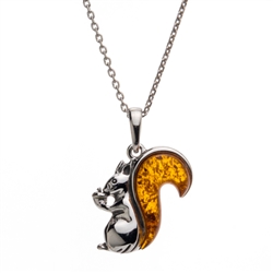 Sterling silver squirrel with a beautiful honey amber tail. Pendant size is approx. 1" x .75".