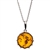 A sterling silver crown is the frame for this beautiful round honey amber cabochon.  Pendant size is approx. 1" x .75".