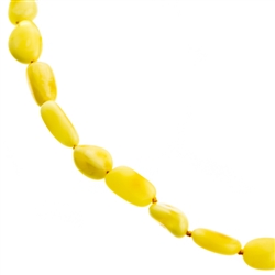 This beautiful beaded amber necklace features oval Baltic custard color amber beads strung together, and finished with an amber screw closure. The beads are knotted between each bead.