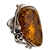A beautiful amber cabochon framed in a classic sterling silver frame. Size is approx 1" x 1.4".
