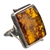 A beautiful amber cabochon framed in a classic sterling silver frame. Size is approx 1.1" x 1".