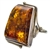 A beautiful amber cabochon framed in a classic sterling silver frame. Size is approx 1.25" x 1".
