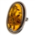 A beautiful amber cabochon framed in a classic sterling silver frame. Size is approx 1.5 x .75".