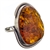 A beautiful amber cabochon framed in a classic sterling silver frame. Size is approx 1.25" x 1".