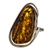 A beautiful amber cabochon framed in a classic sterling silver frame. Size is approx 1.5" x .8".