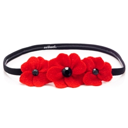 Beautiful handmade felt poppy headpiece. No slip grip elastic band (Scunci Brand).  One size fits all.