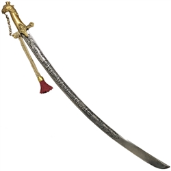 A beautiful saber from the collection of Jan III Sobieski from the 17th century. The hilt of the saber is made entirely of brass. The head of the handle is shaped like a stylized eagle's head with an open crown, which is held in its beak by a chain connec