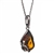 A beautiful honey amber cabochon framed in an open back sterling silver frame. Pendant size is approx. .75" x .5".