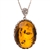 Beautiful amber cabochon surrounded by a sterling silver frame on an adjustable length chain.  Pendant size is approx. 1.25" x 1".