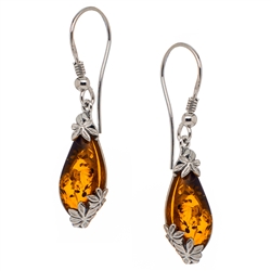 Honey amber wrapped in Sterling Silver teardrops. Stylish and unique. Size is approx 1.5" x .4"