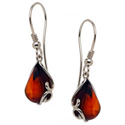 Cherry amber framed in Sterling Silver teardrops.  Size is approx 1.25" x .4"
