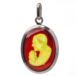 Hand carved cameo of St. John Paul II set in a open back sterling silver frame. Size is approx 1.5" x 1".