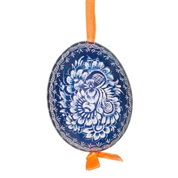 This beautifully designed chicken egg is dyed one color and the design scratched into the egg using a sharp knife. The technique is called "skrobanki" in Polish. The eggs have been emptied and strung through with ribbon for hanging. No two eggs are exactl