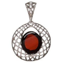 Beautiful cherry amber cabochon framed in antique style sterling silver. Please note that this picture was taken with background light to highlight the interior. Actual appearance is dark cherry. Size is approx 1.5" x 1".