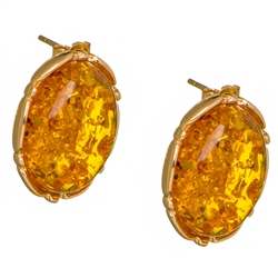 Gorgeous Baltic Amber earrings surrounded with a ring 14kt gold. Size is approx 1" long x .75" wide.  Weight is approx 9.5 grams.  Matching pendant is available.