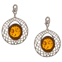Gorgeous Baltic Amber earrings surrounded with a ring of Sterling Silver filigree work. Approx 1.5" long x 1.1" wide.