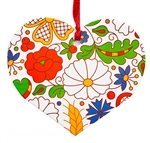 Folk art is the perfect souvenir from Poland. This ornament is inspired by Kashubian floral patterns from the region of Kociewie. Made of thick cardboard and paper covered with foil flash.