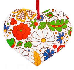 Folk art is the perfect souvenir from Poland. This ornament is inspired by Kashubian floral patterns from the region of Kociewie. Made of thick cardboard and paper covered with foil flash.