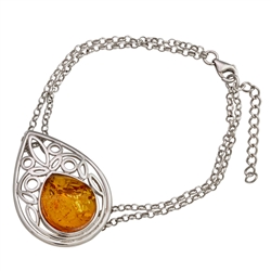 This sterling silver bracelet features a gorgeous oval amber cabochon. Size is adjustable to 7.5" diameter.