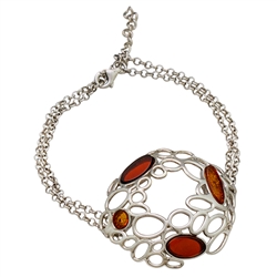 This lovely sterling silver bracelet highlights 4 pieces of amber. Size is 7" diameter. Centerpiece is approx 1.5" x 1".