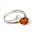 Stylish and delicate sterling silver ring with amber and pearl. Amber is very soft and in this setting must be treated with care.  Ring should be removed before washing your hand.
&#8203;