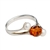 Stylish and delicate sterling silver ring with amber and pearl. Amber is very soft and in this setting must be treated with care.  Ring should be removed before washing your hand.
&#8203;