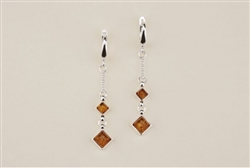 Honey Amber Earrings. Size Approx 2" x .25".
Amber is soft, only slightly harder than talc, and should be treated with care.