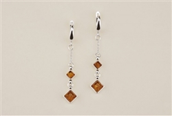 Honey Amber Earrings. Size Approx 2" x .25".
Amber is soft, only slightly harder than talc, and should be treated with care.