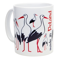 This attractive ceramic mug features the storks that summer in Poland to raise their families before returning to Africa for the winter. Dishwasher safe. Made In Poland.